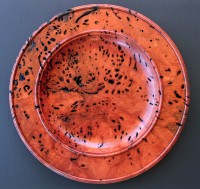 Red River - 
	This shallow platter was created from a slab of Australian River Red 